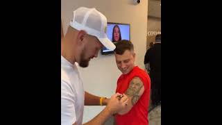 Tyson Fury signing fans arm tattoo