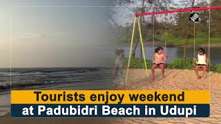 Tourists enjoy weekend at Padubidri Beach in Udupi