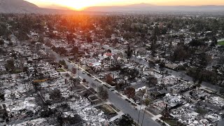 LA fire evacuees escorted back home to assess damage