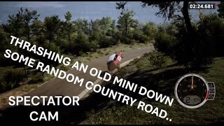 Thrashing an old Mini Cooper down some country road