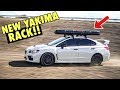 SUBARU STI YAKIMA ROOF RACK INSTALL (Best Fishing Setup ever!) rod/reel carrier & kayak mount