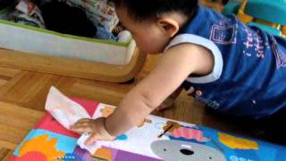 Joseph starts to help mom clean before he is 1-year old