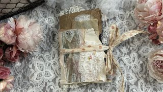 Flip through video of a small pocket size junk journal, shabby chic style