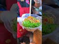 giant seafood dipping sauce famous grilled squid shop in bangkok thailand. streetfood shorts