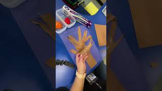 Fall into creativity with this unique tree art project! Ripping brown paper for trunks and using cru