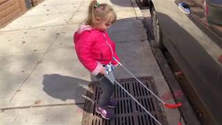 Léa three year old CVI walking her sidewalk wearing her Toddler Cane