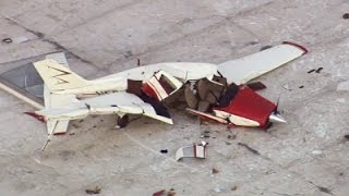 Raw: Small Plane Lands on Texas Warehouse Roof