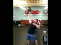 ed tessel demonstrating 80lb kettlebell bottoms up press