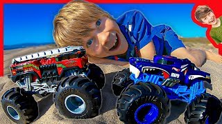 HOT WHEELS MONSTER TRUCKS AT THE BEACH WITH AXEL AND DADDY!