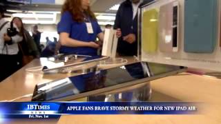 Apple Fans Brave Stormy Weather For New iPad Air