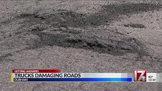 Road in Durham neighborhood damaged by heavy trucks