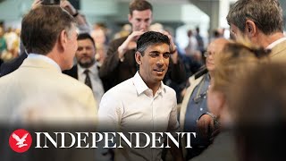 Rishi Sunak greets Tory members as party delays sending ballot papers due to security concerns