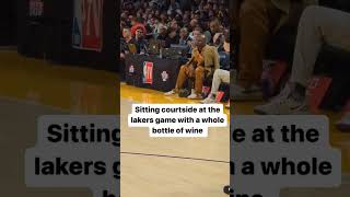 Corey Gamble Courtside At the Lakers game with a whole bottle of wine 👀😂