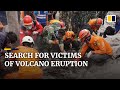 Volunteer rescuers search for victims of Indonesia’s deadly Semeru volcano eruption