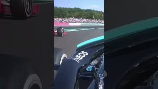Lewis Hamilton overtakes Charles Leclerc at Copse corner