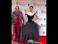 Daisy Ridley on the red carpet at the BAFTA Awards with her mum