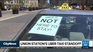 Uber-Taxi standoff at Union Station