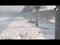 yamuna river polluted toxic foam floats in yamuna river