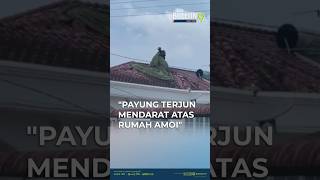 Seorang anggota pasukan payung terjun berkongsi detik salah mendarat atas bumbung sebuah rumah.