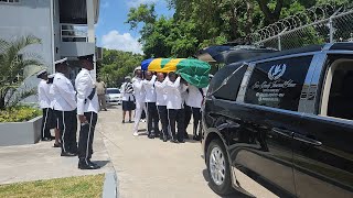 Allan Cruickshank's body leaves the House of Assembly