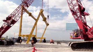 Montage d'une grue sur portique