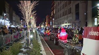 Community braves the cold for downtown holiday parade, tree lighting