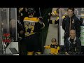 liam fitzgerald fist bumps boston bruins after their pregame warm up