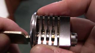 Demo of a Medeco factory cutaway rim cylinder.