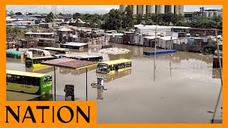 City Hoppa buses stuck in floodwater at Kware area in Pipeline