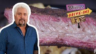 Guy Fieri Eats Righteous Wings \u0026 MASSIVE Beef Ribs | Diners, Drive-Ins and Dives | Food Network