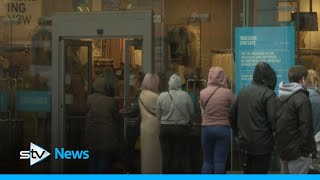 Huge queues as non-essential shops reopen for business