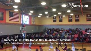 SPM's Quion Sneed with a nice bounce pass to Bam Brima for a layup vs. Doherty in the City Tournamen