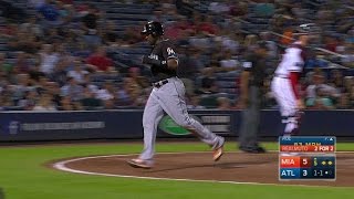 MIA@ATL: Realmuto scores Ozuna on groundout in 5th