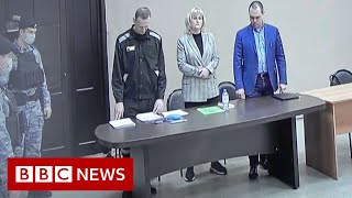 Putin critic Alexei Navalny jailed for nine years in Russian 'sham' trial - BBC News