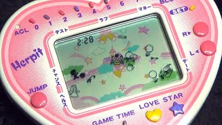 【レトロ 電子ゲーム】バンダイ ふたりのときめき占い ハーピット 天使 運勢 相性 星座 可愛い ハート型 液晶 時計機能付き 玩具  bandai made in japan 1983 ブラゼ