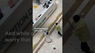 Chinese Woman Destroys Hospital Robot