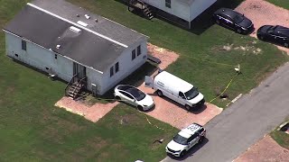 Crime scene tape surrounds home in Sumter County