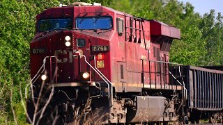 Friendly Crew!!! CP (8768) leads Train 242 South. Penhold AB May 27th 2023.