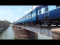 kerala express roars over paravur bridge