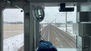 Japanese train!  Shinetsu Line E129 series running through a snowy field front view video