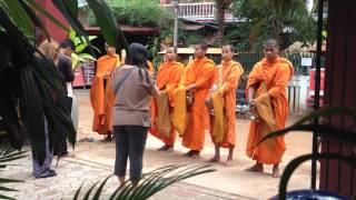 Monks Begging for Arms