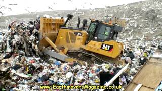 Cat D7E Hybrid dozer in landfill