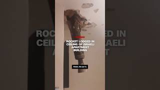 Rocket lodged in ceiling of Israeli apartment building