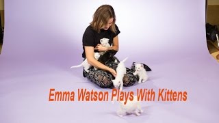 Emma Watson Plays With Kittens when she answering the question
