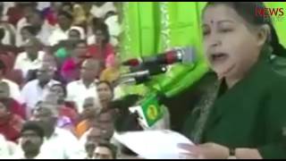 File video of J Jayalalithaa recounting OPS's long political history and praising his patience