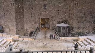 Snow falls on the Damascus Gate - the most beautiful gate of the Old City of Jerusalem.