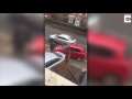 angry lads bash car blocking them on driveway