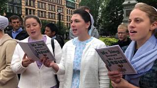 Mennonite youth choir sings in Springfield's Court Square