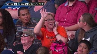 Excited fan waves towards the camera