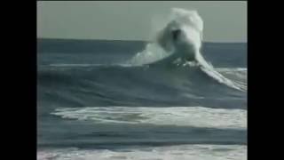 MASSIVE - Bodyboarder gets blasted by huge backwash in surf
